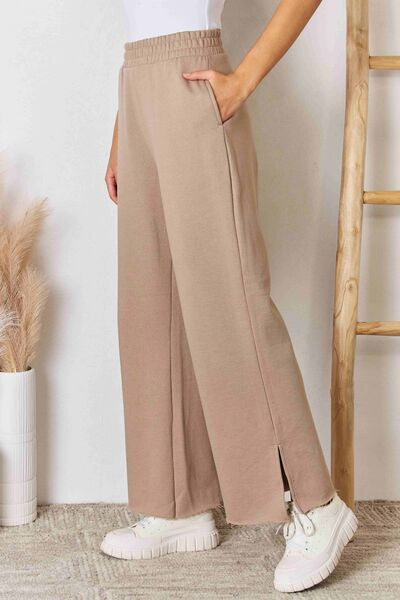 swvws RISEN Wide Waistband Slit Wide Leg Pants