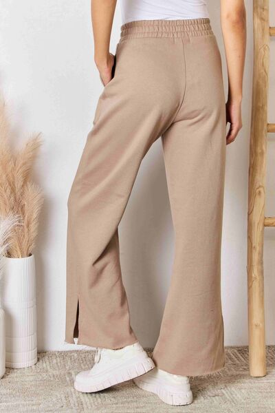 swvws RISEN Wide Waistband Slit Wide Leg Pants