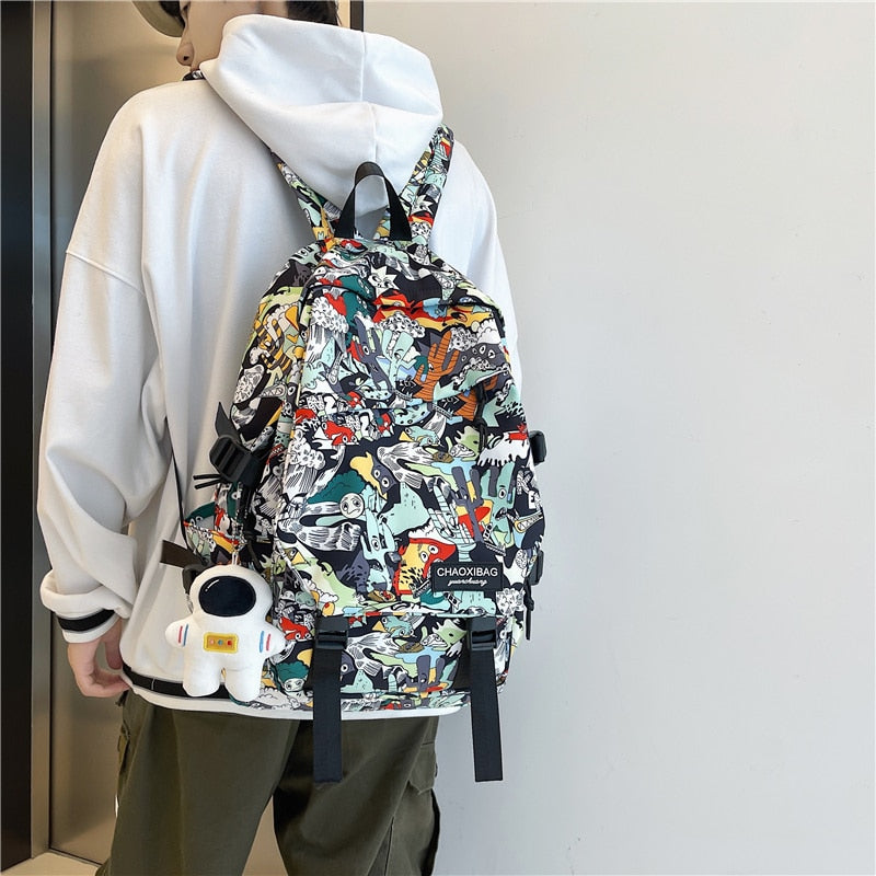 swvws Harajuku Girl Male School Bag Female Graffiti Print Men Backpack Women Book Boy Bag Nylon Ladies Fashion Laptop Backpack Student