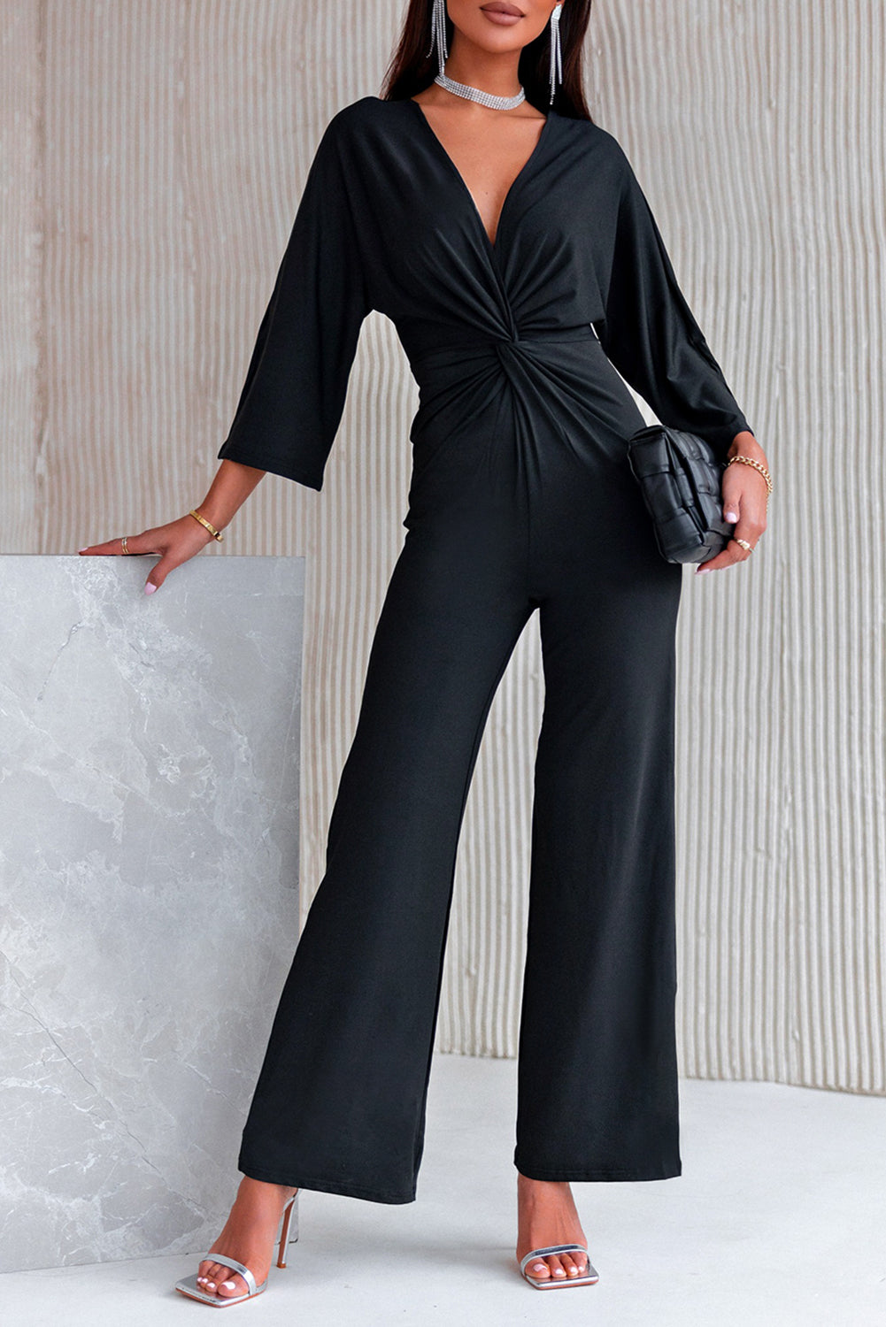 swvws Twisted Plunge Three-Quarter Sleeve Jumpsuit